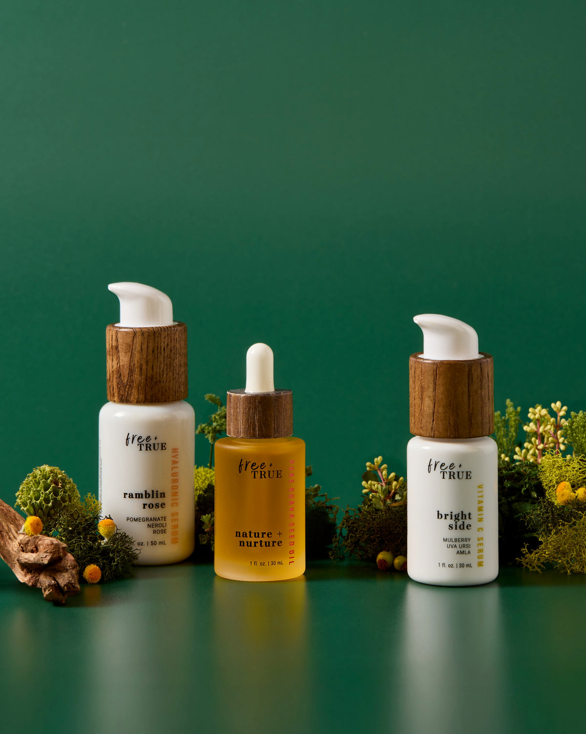 The Serum Trio — Ramblin Rose, Bright Side and Nature + Nurture on moss