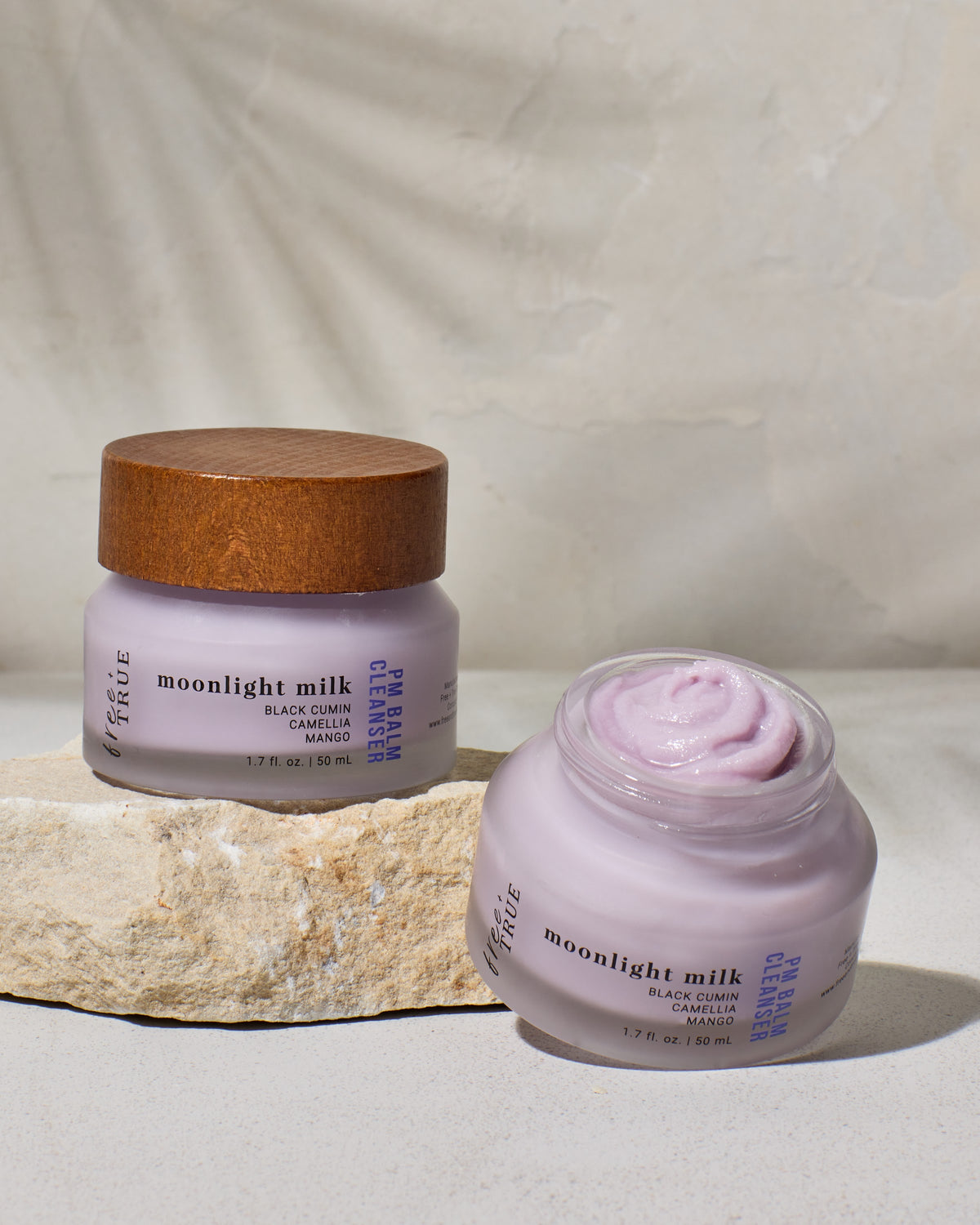 Moonlight Milk — open jar and purple balm texture