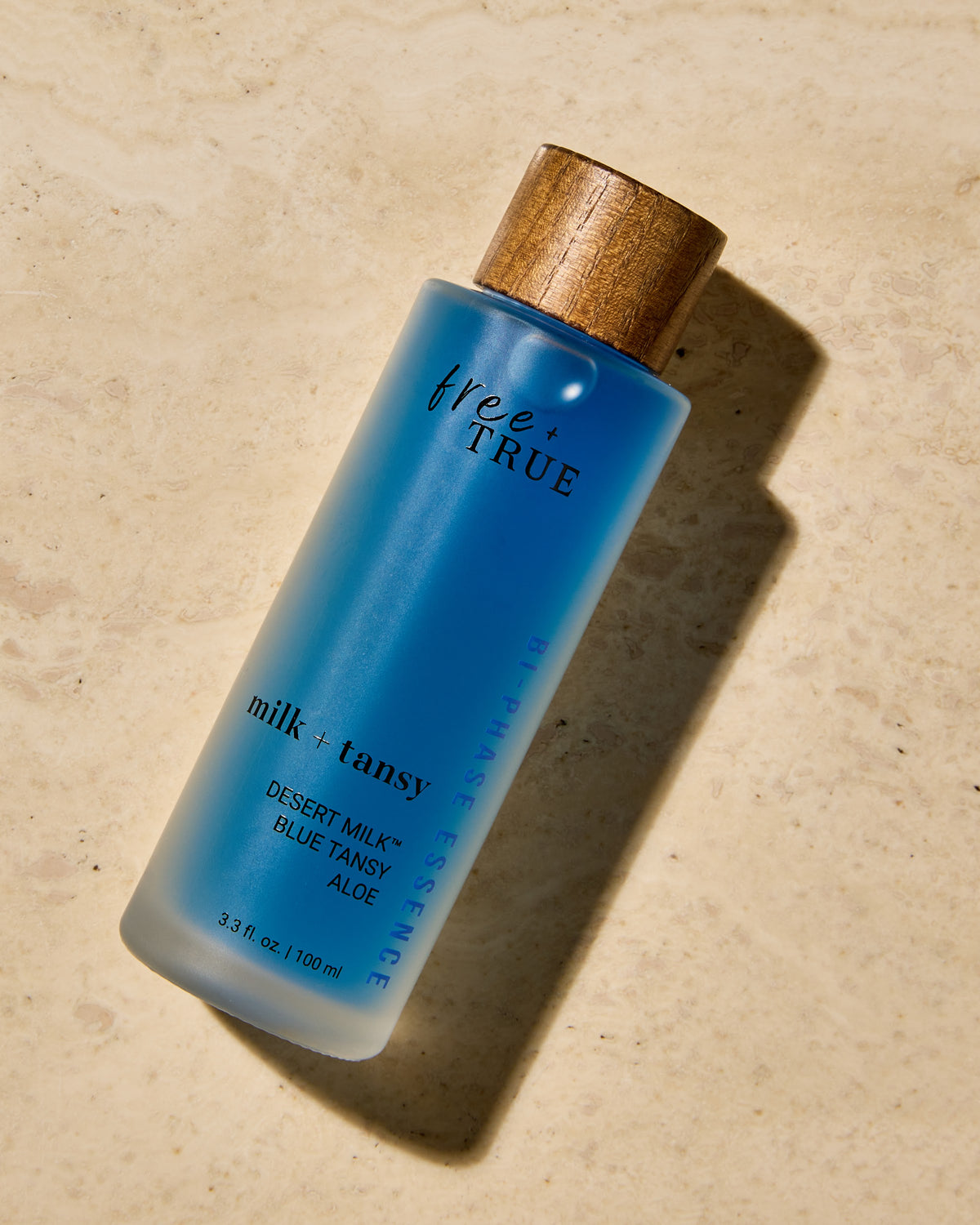 Milk + Tansy — bottle in sunlight